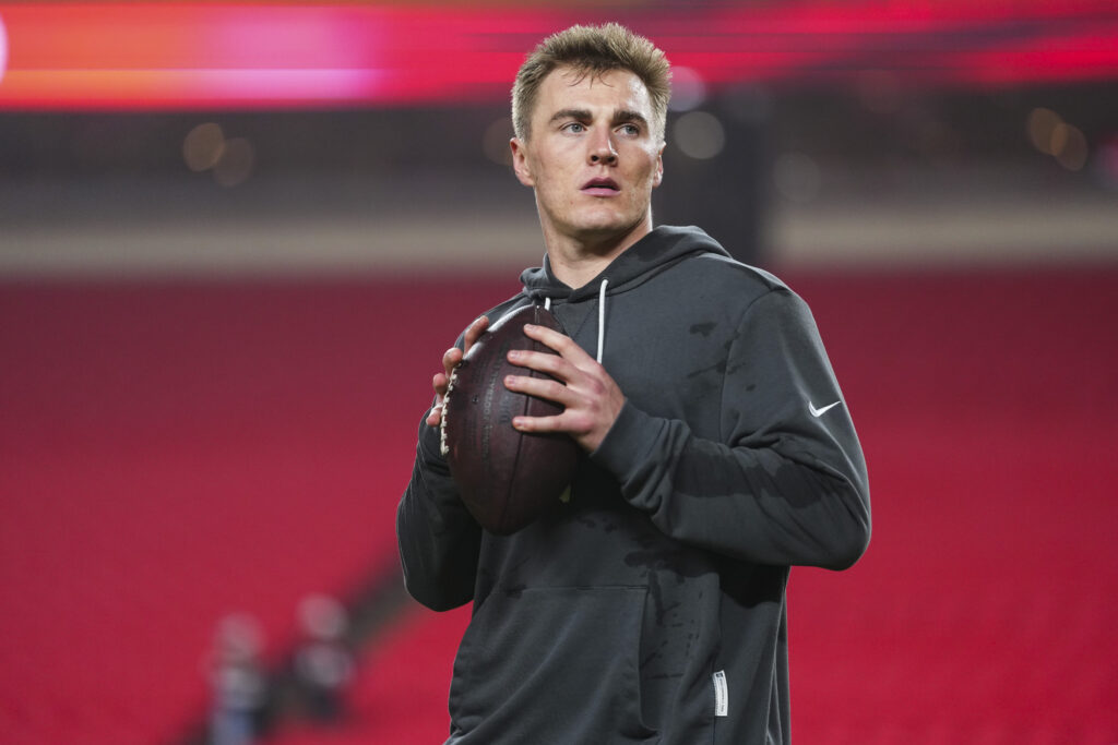 Bo Nix #10 of the Denver Broncos warms up prior to an NFL football game against the Kansas City Chiefs at GEHA Field.