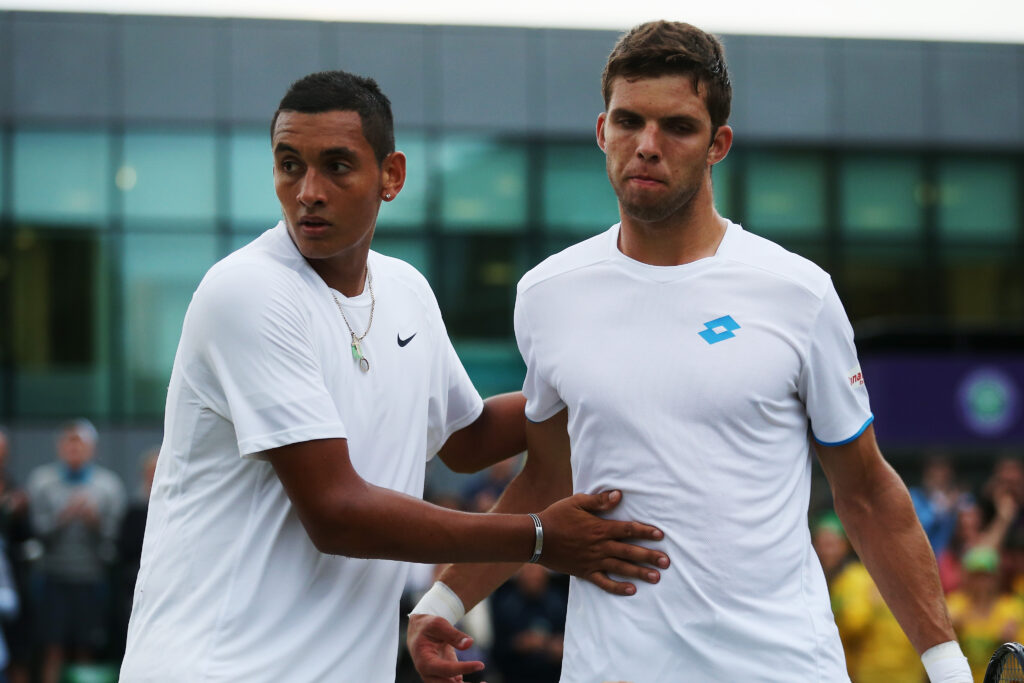 Nick Kyrgios shakes hands with Jiri Vesely after beating him in the third round of Wimbledon in 2014.