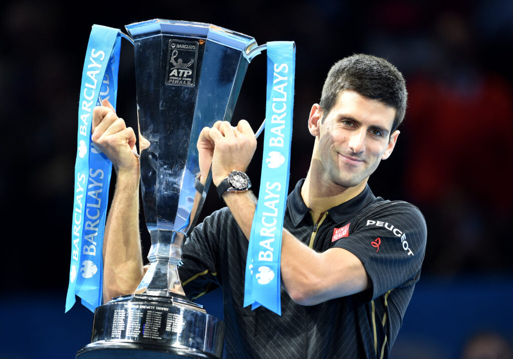 Novak Djokovic celebrating with the 2014 ATP Finals title