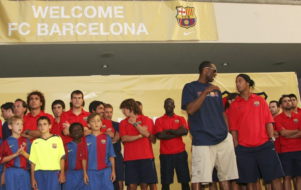 Kobe Bryant of the Los Angeles Lakers and Ronaldinho of Brazil speak at Nike European Club Champion FC Barcelona Rally