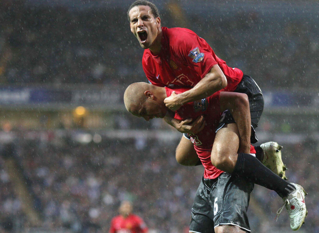 Wes Brown of Manchester United celebrates scoring their first goal with Rio Ferdinand during the FA Premier League match between Blackburn Rovers and Manchester United at Ewood Park.