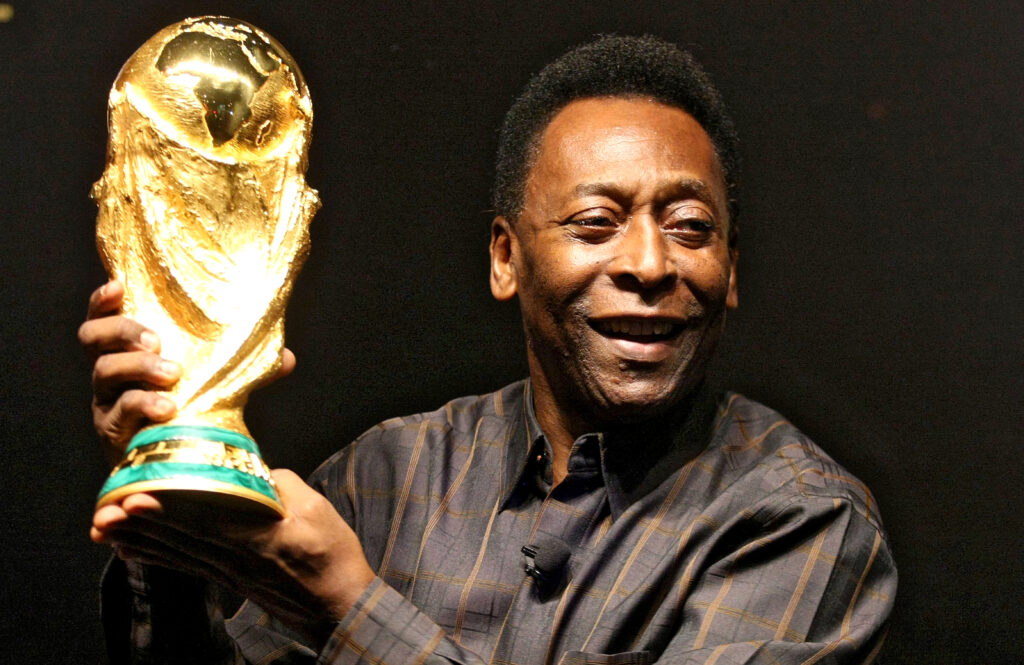 Brazilian football star Pele displays the FIFA World Cup during its presentation in Rio de Janeiro, Brazil on February 6, 2010. The cup is being exhibited in numerous countries while on a tour before reaching South Africa for the FIFA World Cup tournament that will be held next June