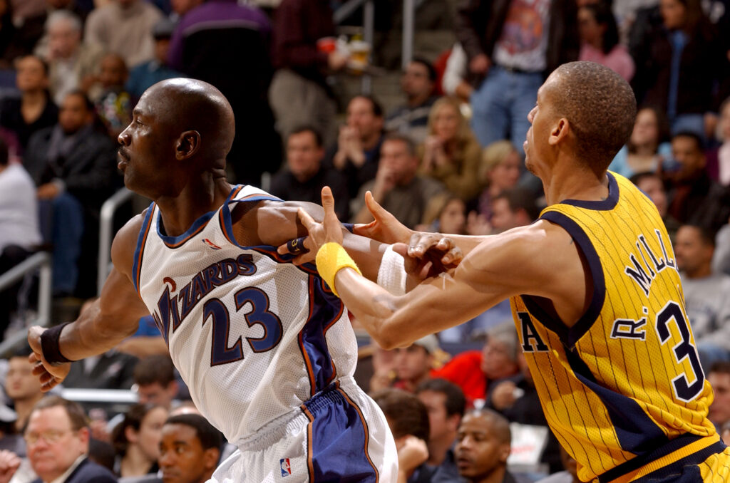 Michael Jordan #23 of the Washington Wizards plays against Reggie Miller #31 of the Indiana Pacers.