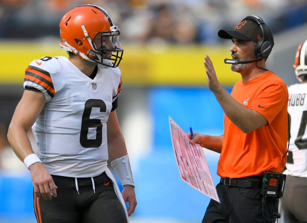 Baker Mayfield #6 of the Cleveland Browns talks to head coach Kevin Stefanski at SoFi Stadium on October 10, 2021 in Inglewood, California.