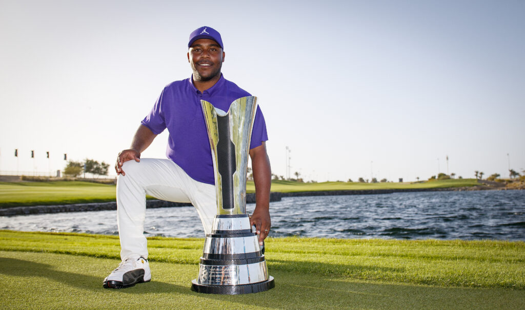 Harold Varner III of USA poses for a photo with the trophy after winning LIV Golf DC