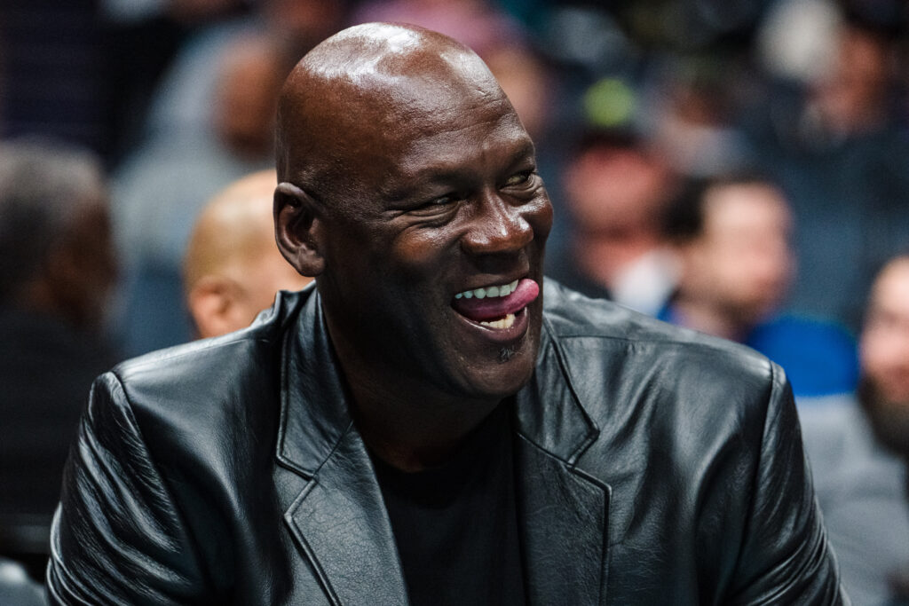 Charlotte Hornets owner Michael Jordan looks on in the fourth quarter during their game against the Orlando Magic at Spectrum Center.