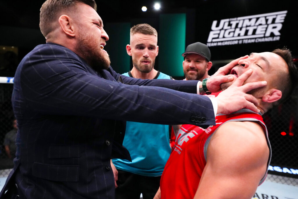 Conor McGregor pushes Michael Chandler during the filming of The Ultimate Fighter at UFC APEX.