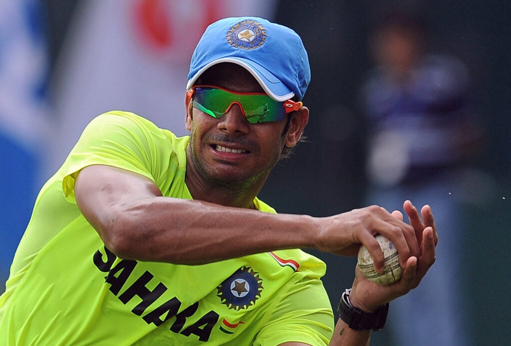 Indian cricketer Manoj Tiwary catches a ball during a training session in Colombo.