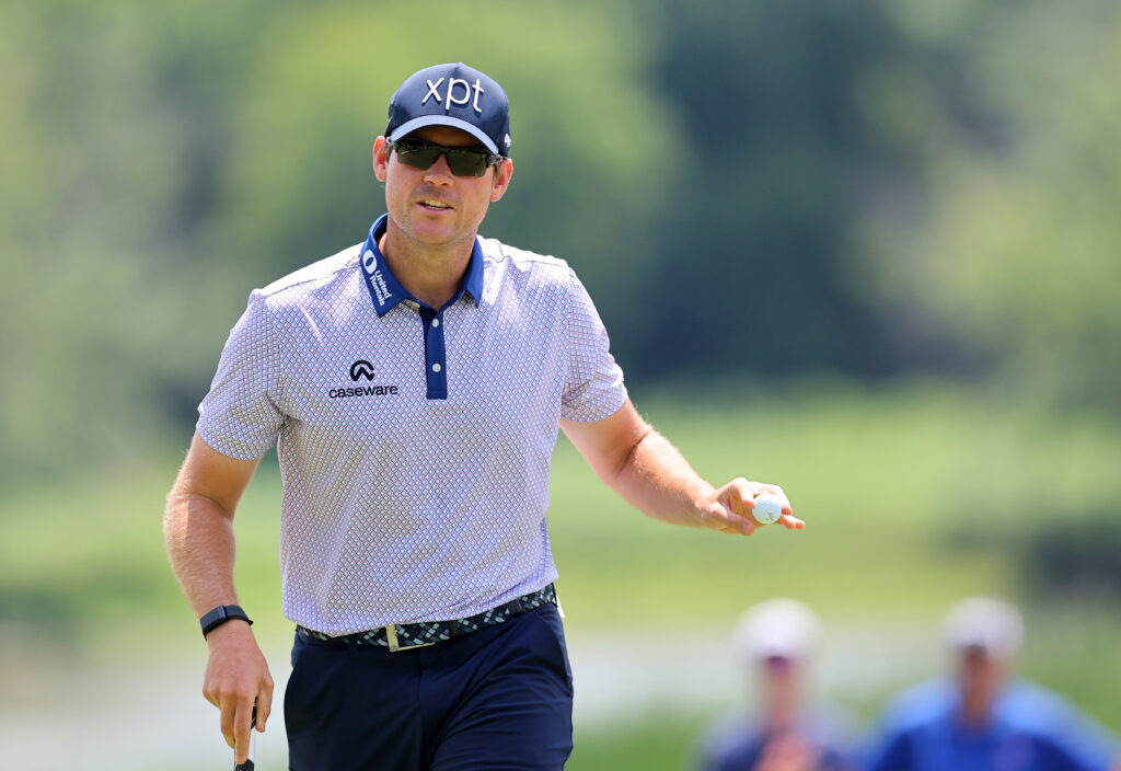 Adam Schenk of the United States reacts to eagle putt on the second green during the third round of the John Deere Classic at TPC Deere Run on July 08, 2023