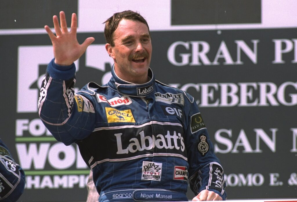 Nigel Mansell on the podium at the 1992 Formula 1 San Marino Grand Prix