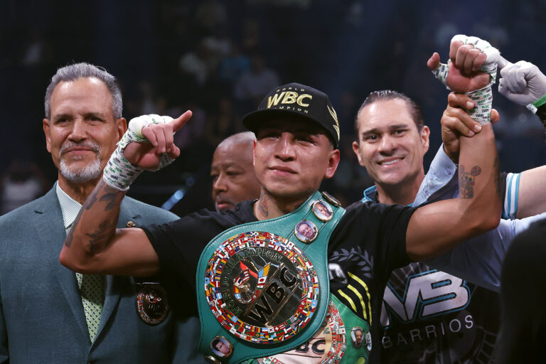 LAS VEGAS, NEVADA - SEPTEMBER 30:  Mario Barrios (black trunks) reacts after defeating Yordenis Ugas (white trunks) by decision in their interim WB...