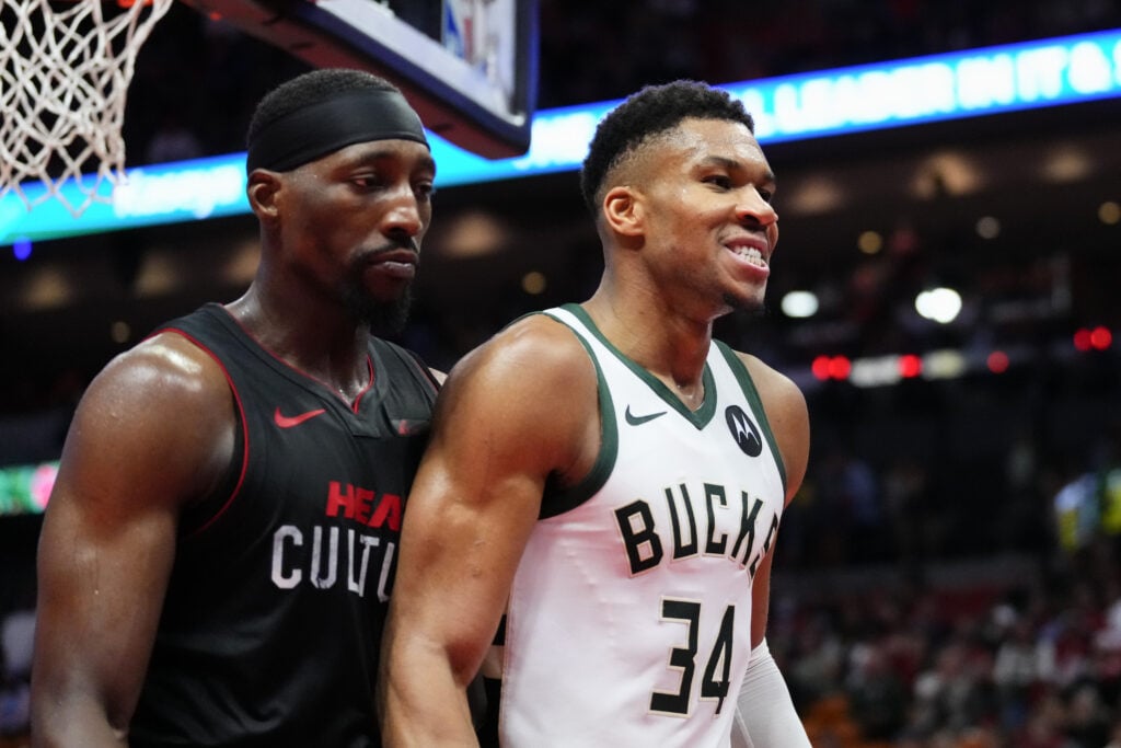 Giannis Antetokounmpo #34 of the Milwaukee Bucks reacts after scoring against Bam Adebayo #13 of the Miami Heat in the fourth quarter during the NBA In-season Tournament game at Kaseya Center on November 28, 2023.