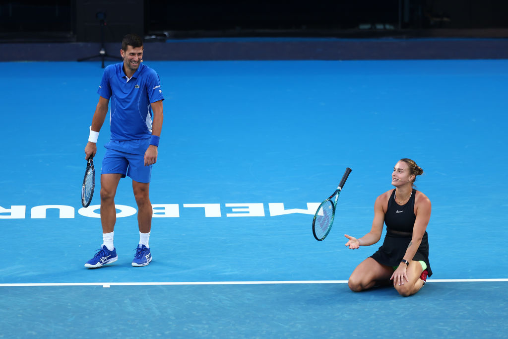 Novak Djokovic laughs as Aryna Sabalenka collapses on court