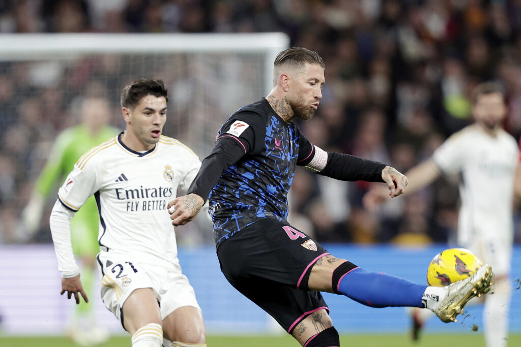 Brahim Diaz of Real Madrid, Sergio Ramos of Sevilla FC during the LaLiga EA Sports match between Real Madrid vs Sevilla at the Santiago Bernabeu Stadium.