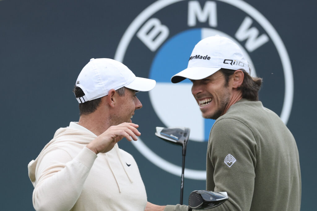 Gareth Bale talks to Rory McIlroy during a pro-am at Wentworth 2024