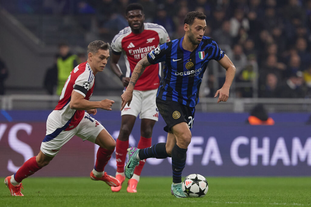 Hakan Calhanoglu of FC Internazionale is in action during the UEFA Champions League 2024/25 League Phase MD4 match between FC Internazionale Milano and Arsenal FC.