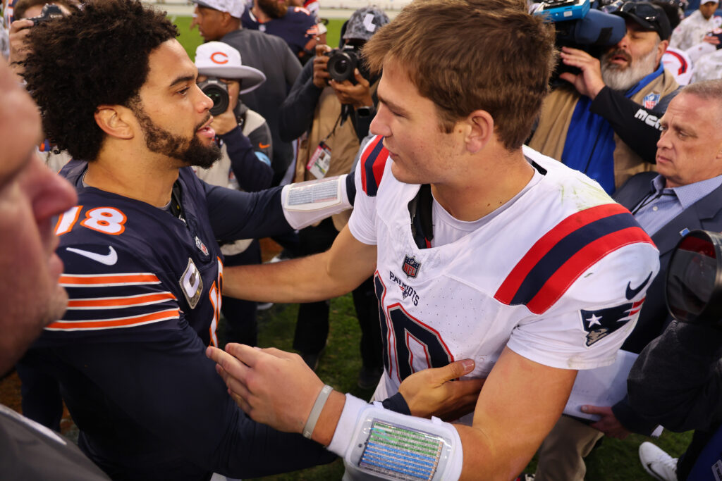 Caleb Williams #18 of the Chicago Bears greets Drake Maye #10 of the New England Patriots after the game at Soldier Field on November 10, 2024 in Chicago, Illinois.