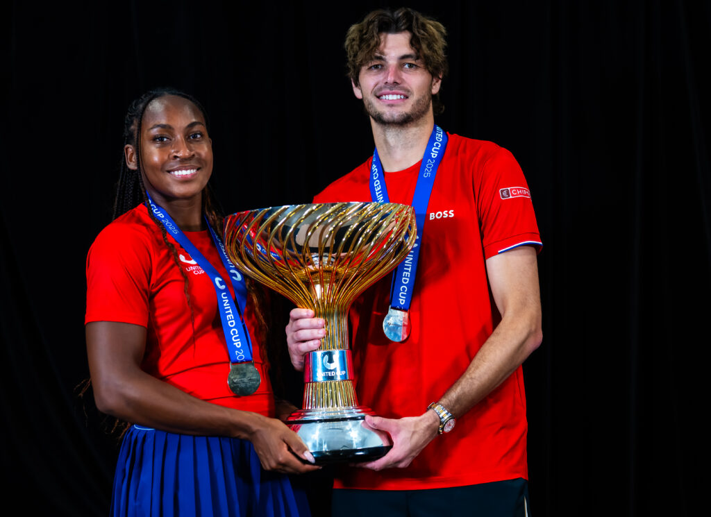 Taylor Fritz and Coco Gauff celebrate after winning the United Cup in 2025