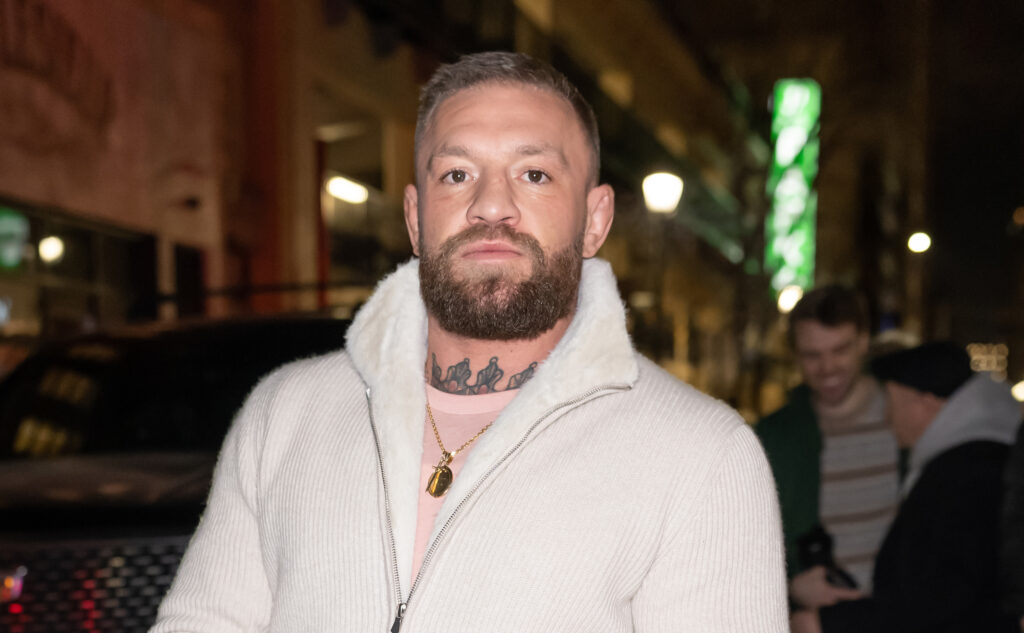 Conor McGregor is seen leaving 1518 Bar & Grill after a surprise appearance for "Bare Knuckle Fighting Championship x Forged Irish Stout" BKFC Ticket Giveaway.