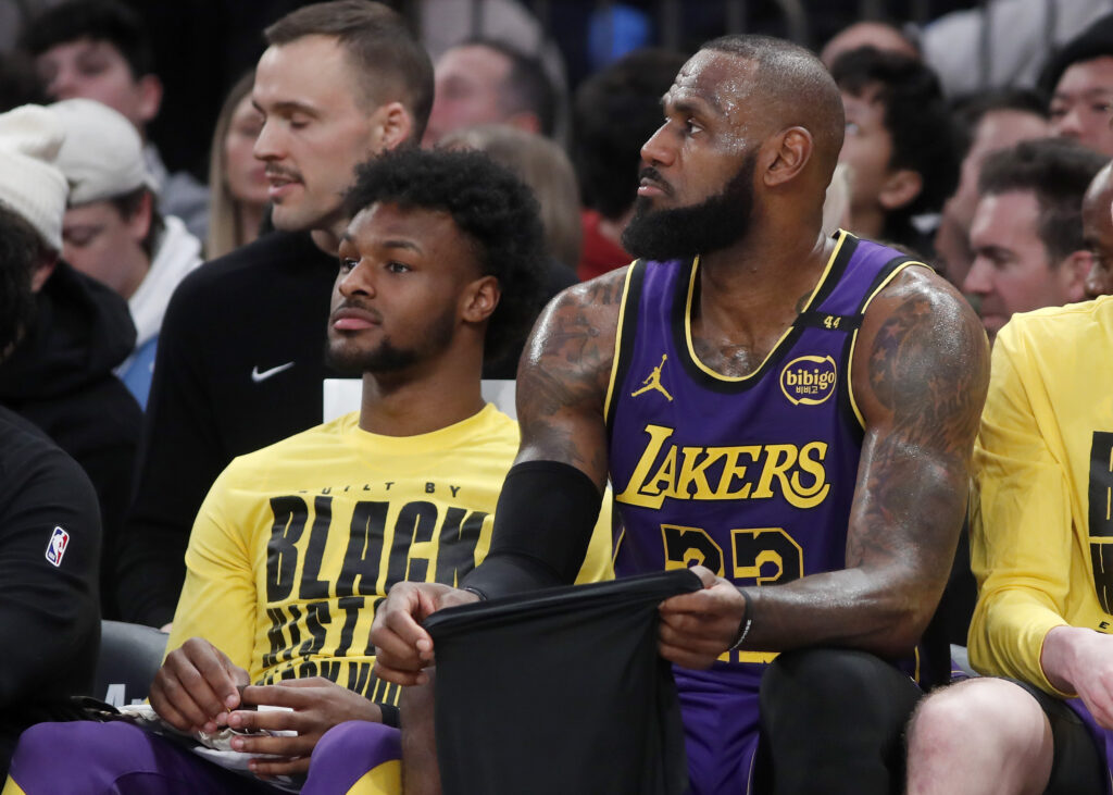 LeBron James #23 and Bronny James #9 of the Los Angeles Lakers.