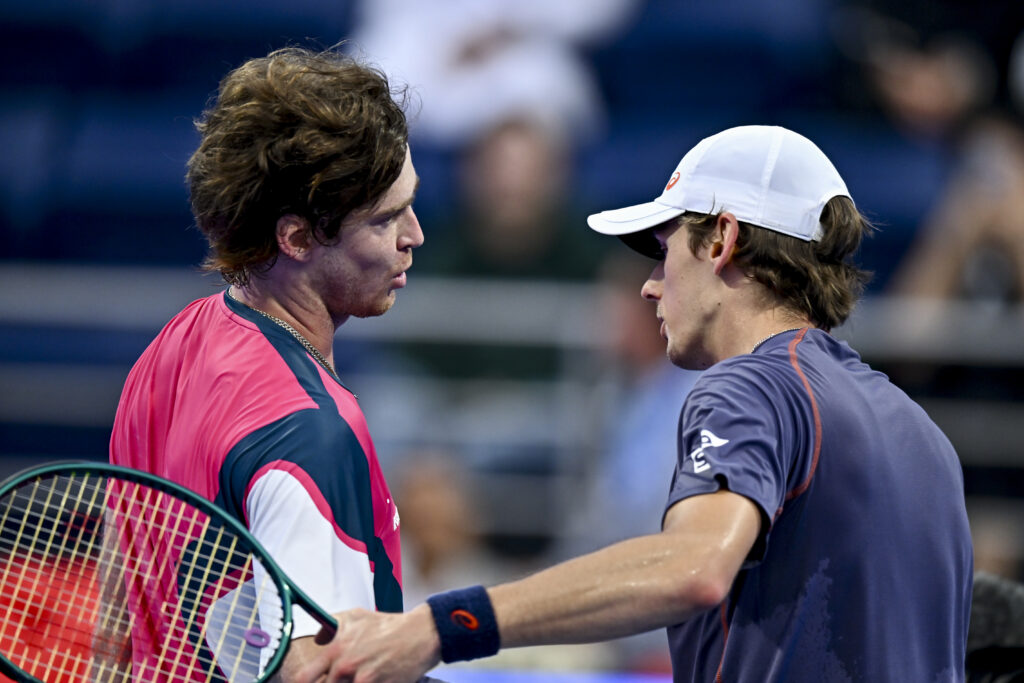 Andrey Rublev shakes hands with Alex de Minaur after beating him at the 2025 Qatar Open.