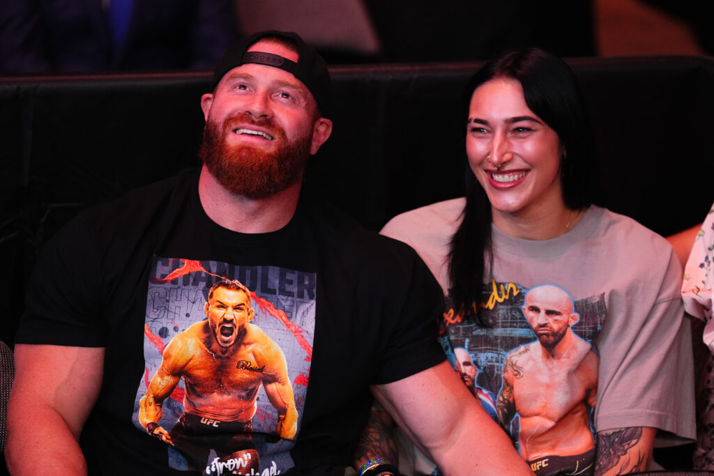Buddy Matthews and Rhea Ripley are seen in attendance during the UFC 314 event at Kaseya Center on April 12, 2025 in Miami, Florida.