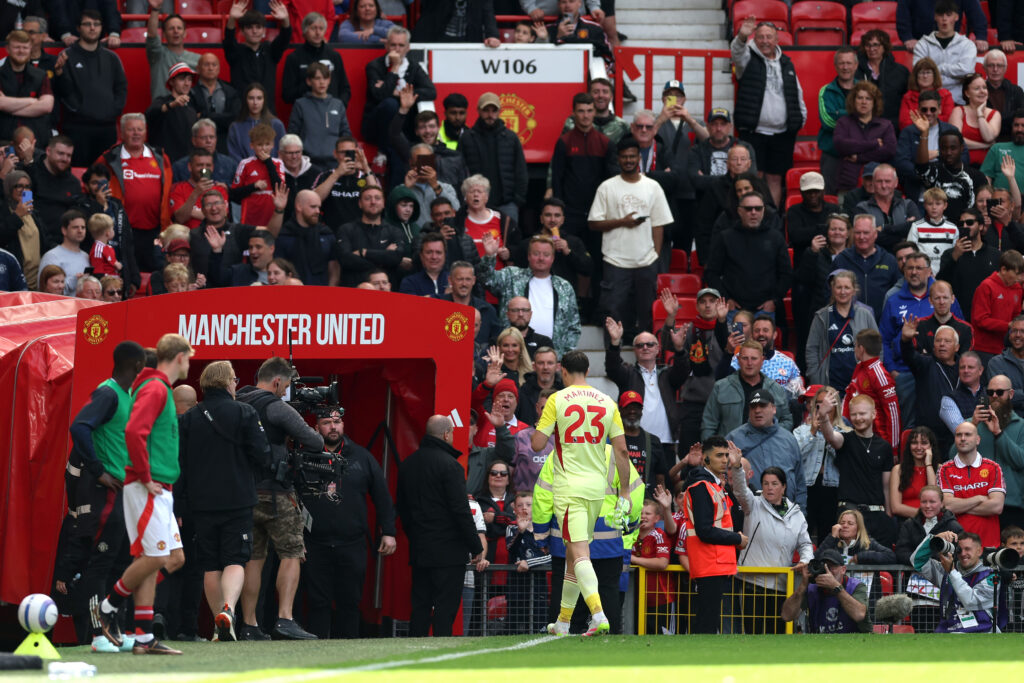 Emiliano Martinez of Aston Villa walks down the tunnel after being shown a red card for a foul on Rasmus Hojlund of Manchester United during the Premier League.