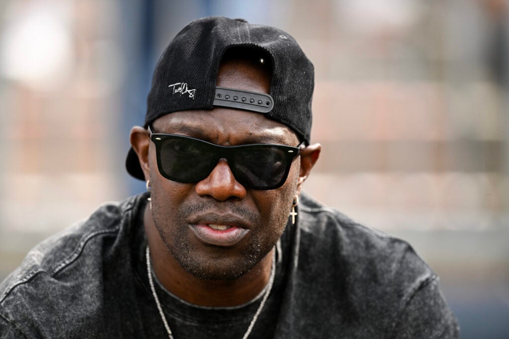 Former NFL player Terrell Owens looks on during a game between the DC Defenders and the Houston Roughnecks in the second quarter of a game at TDECU Stadium.