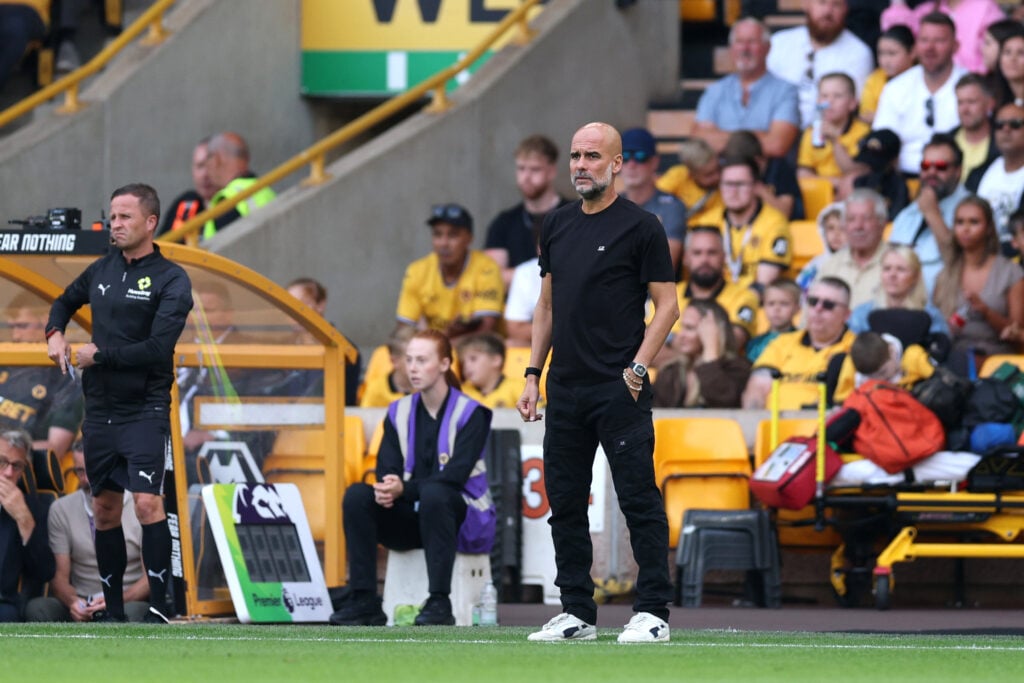 Pep Guardiola, Manager of Manchester City looks on during the Premier League match between Wolverhampton Wanderers and Manchester City at Molineux on August 16, 2025.