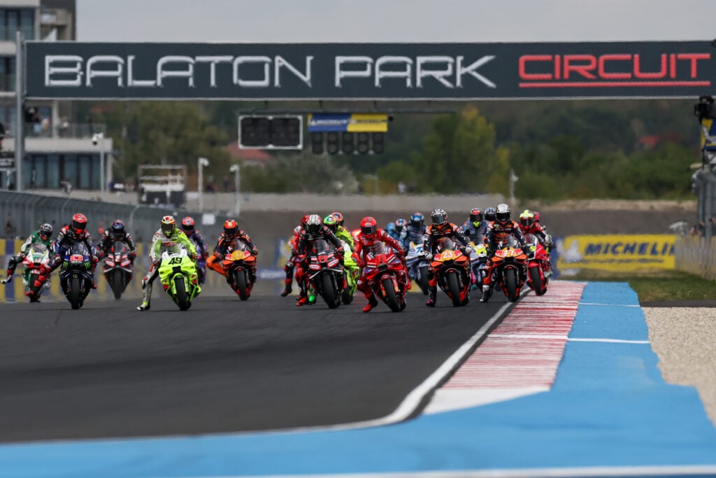 The 2025 MotoGP grid head to the first corner at the start of the Hungarian Grand Prix
