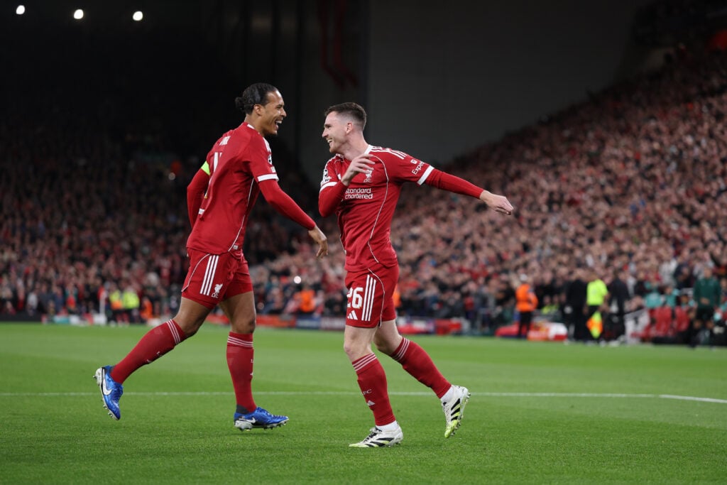 Andrew Robertson of Liverpool celebrates his goal to make it 1-0 with Virgil van Dijk of Liverpool during the UEFA Champions League 2025/26 League Phase MD1 match between Liverpool FC and Atletico de Madrid at Anfield on September 17, 2025 in Liverpool, England.