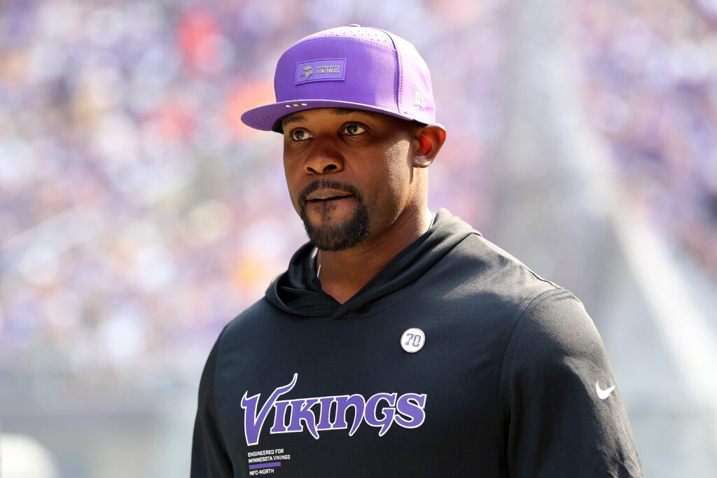 Defensive Coordinator Brian Flores of the Minnesota Vikings looks on prior to the start of the game against the Cincinnati Bengals at U.S. Bank Stadium on September 21, 2025 in Minneapolis, Minnesota.