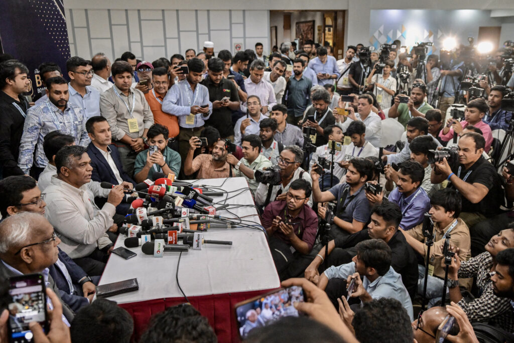 Newly-elected President of the Bangladesh Cricket Board (BCB), Aminul Islam Bulbul (3L), speaks during a press conference in Dhaka.