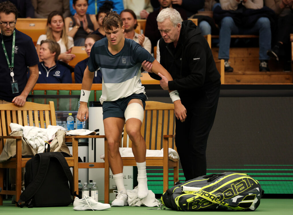 Holger Rune forced to retire with injury during his semifinal against Ugo Humbert at the 2025 Stockholm Open.