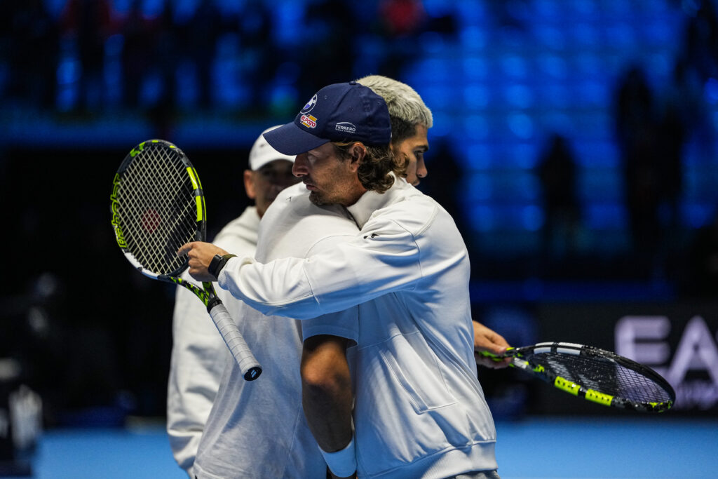 Juan Carlos Ferrero and Carlos Alcaraz embrace at the 2025 ATP Finals