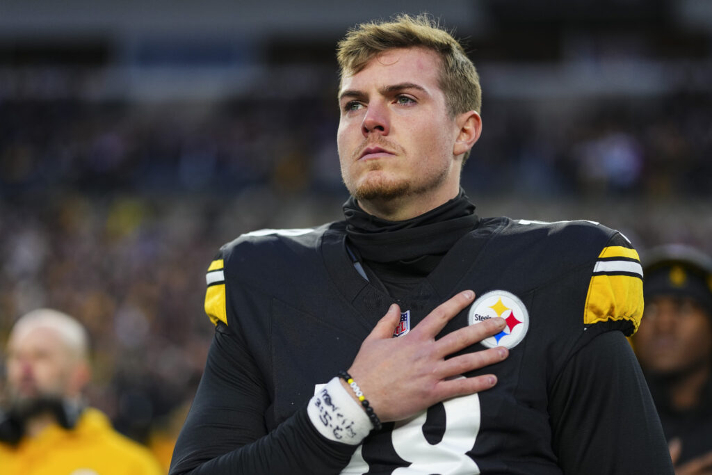 Will Howard #18 of the Pittsburgh Steelers looks on from the sideline during the national anthem prior to an NFL football game against the Buffalo Bills at Acrisure Stadium.