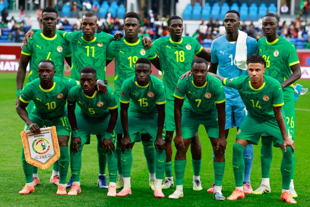 Senegal's head coach Pape Thiaw, Senegal's defender #04 Abdoulaye Seck, Senegal's forward #11 Nicolas Jackson, Senegal's defender #19 Moussa Niakhate, Senegal's forward #18 Ismaila Sarr, Senegal's goalkeeper #16 Edouard Mendy, Senegal's midfielder #26 Pape Gueye, (from bottom L) Senegal's forward #10 Sadio Mane, Senegal's midfielder #05 Idrissa Gueye, Senegal's forward #15 Krepin Diatta, Senegal's midfielder #07 Habib Diarra and Senegal's defender #14 Ismail Jakobs pose before the Africa Cup of Nations (CAN).
