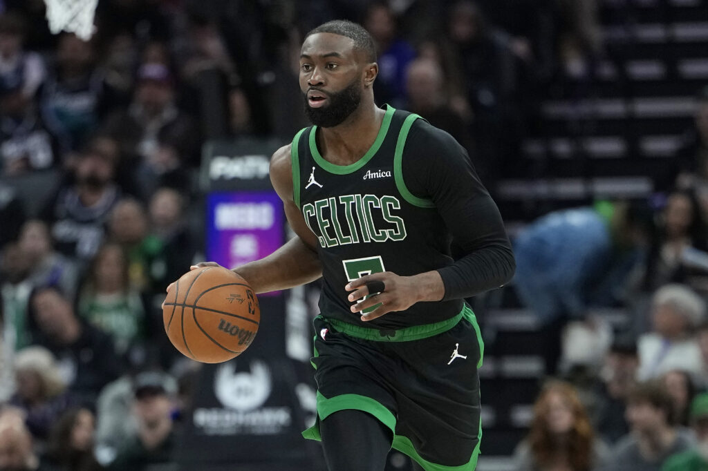 Jaylen Brown #7 of the Boston Celtics dribbles the ball up court against the Sacramento Kings in the second half of an NBA basketball game at Golden 1 Center on January 01, 2026 in Sacramento, California.
