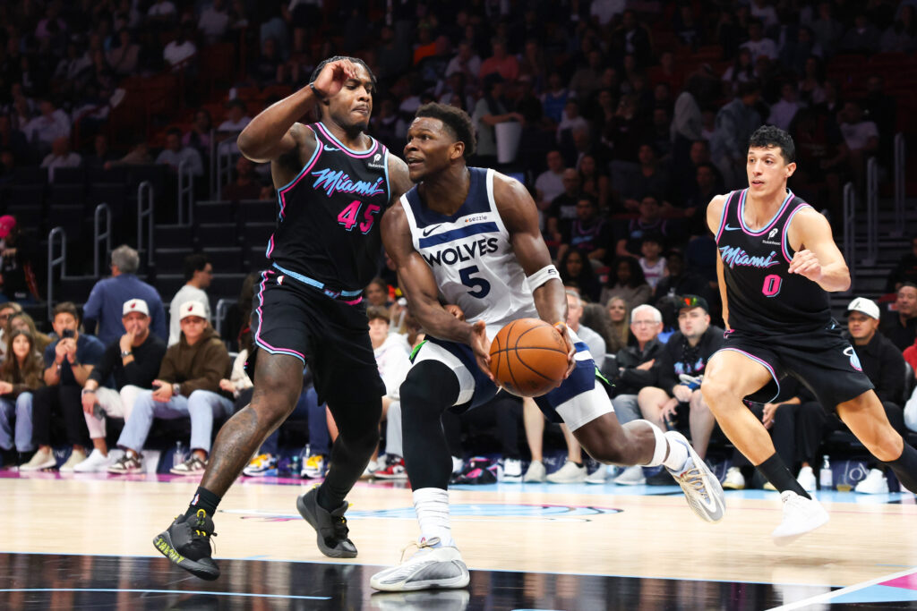Anthony Edwards #5 of the Minnesota Timberwolves drives against Davion Mitchell