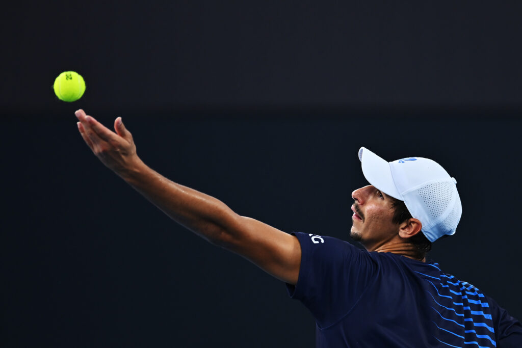 Alexei Popyrin serving.