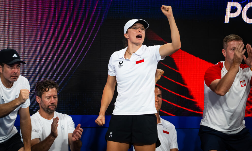 Iga Swiatek of Poland cheers on her team mates during the deciding doubles match of the Australia vs. Poland quarter-final tie on Day 8 of the United Cup at Ken Rosewall Arena on January 09, 2026 in Sydney, Australia