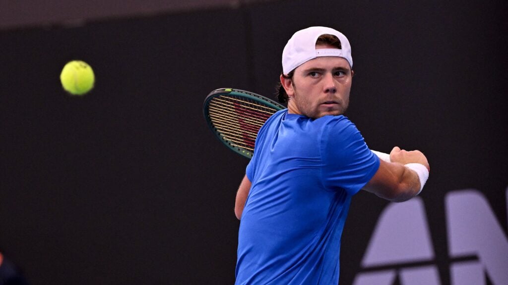 Aleksandar Kovacevic hits a return against Brandon Nakashima at the 2026 Brisbane International.
