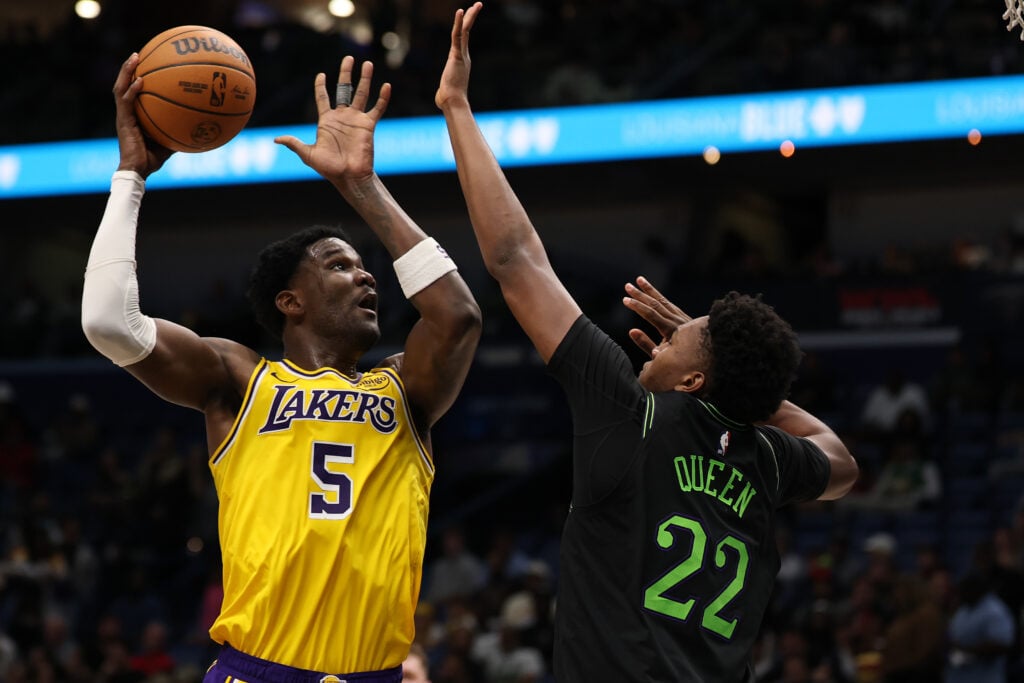 Deandre Ayton #5 of the Los Angeles Lakers shoots the ball over Derik Queen #22 of the New Orleans Pelicans at Smoothie King Center.