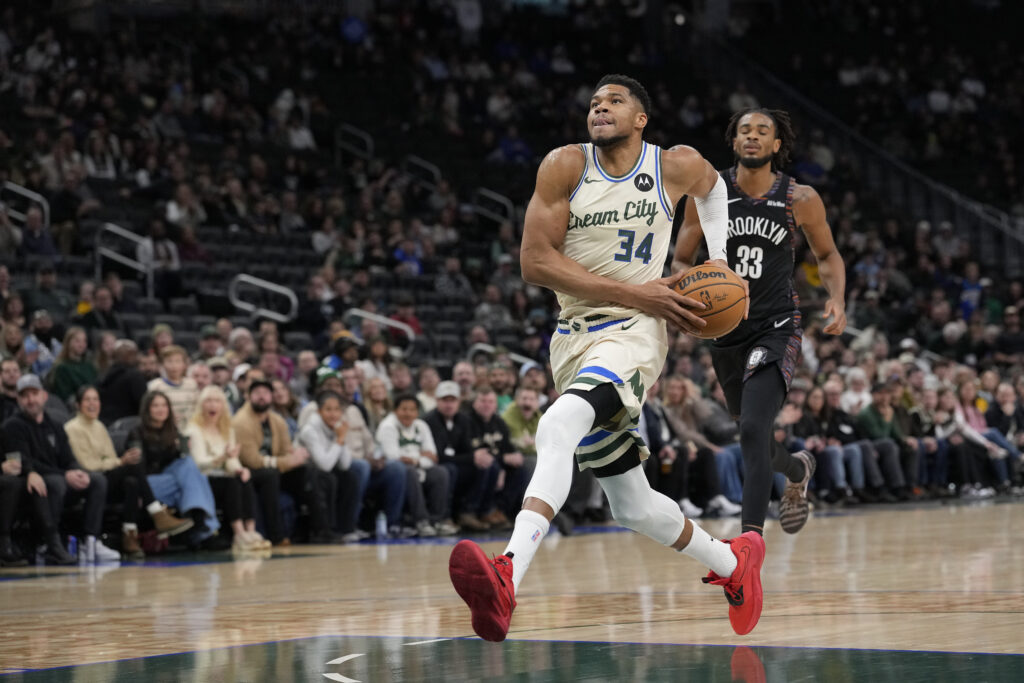 Giannis Antetokounmpo #34 of the Milwaukee Bucks dribbles the ball against the Brooklyn Nets during the first quarter at Fiserv Forum on November 29, 2025 in Milwaukee, Wisconsin.
