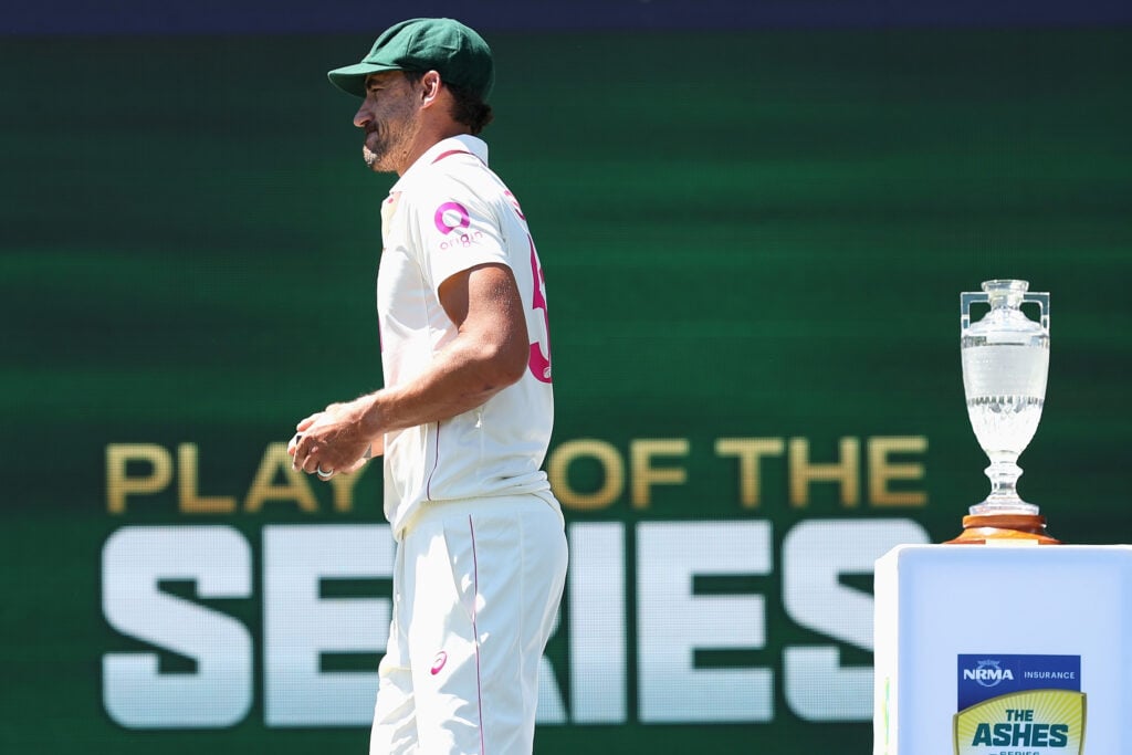 Mitchell Starc of Australia walks onto the stage awarded Player of the Series after winning the Ashes series 4-1 during day five of the Fifth Test in the 2025/26 Ashes Series between Australia and England at Sydney Cricket Ground.