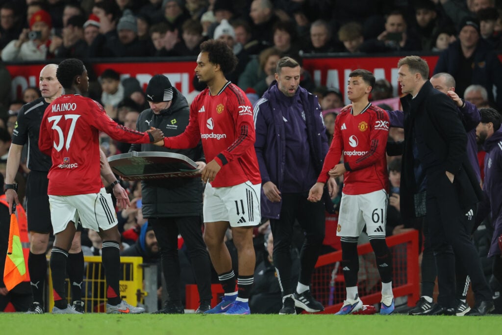 Kobbie Mainoo is replaced by Joshua Zirkzee of Manchester United with Shea Lacey of Manchester United waiting for Darren Fletcher, Caretaker Manager of Manchester United to send him on during the Emirates FA Cup Third Round match between Manchester United and Brighton & Hove Albion.