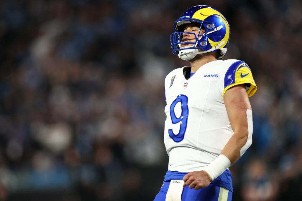 Matthew Stafford #9 of the Los Angeles Rams reacts to a incomplete pass against the Carolina Panthers during the second quarter in the NFC Wild Card Playoff game at Bank of America Stadium.
