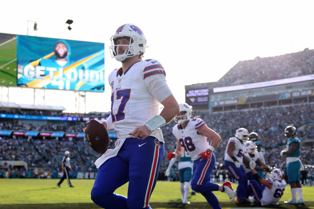 Josh Allen #17 of the Buffalo Bills reacts after rushing for a touchdown during the fourth quarter against the Jacksonville Jaguars in the AFC Wild Card Playoff game