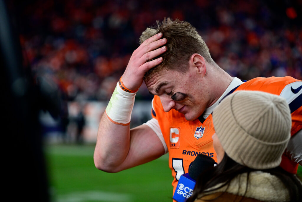 Denver Broncos quarterback Bo Nix (10) gives an interview to Tracy Wolfson of CBS sports after the AFC Divisional Round game against the Buffalo Bills at Empower Field.