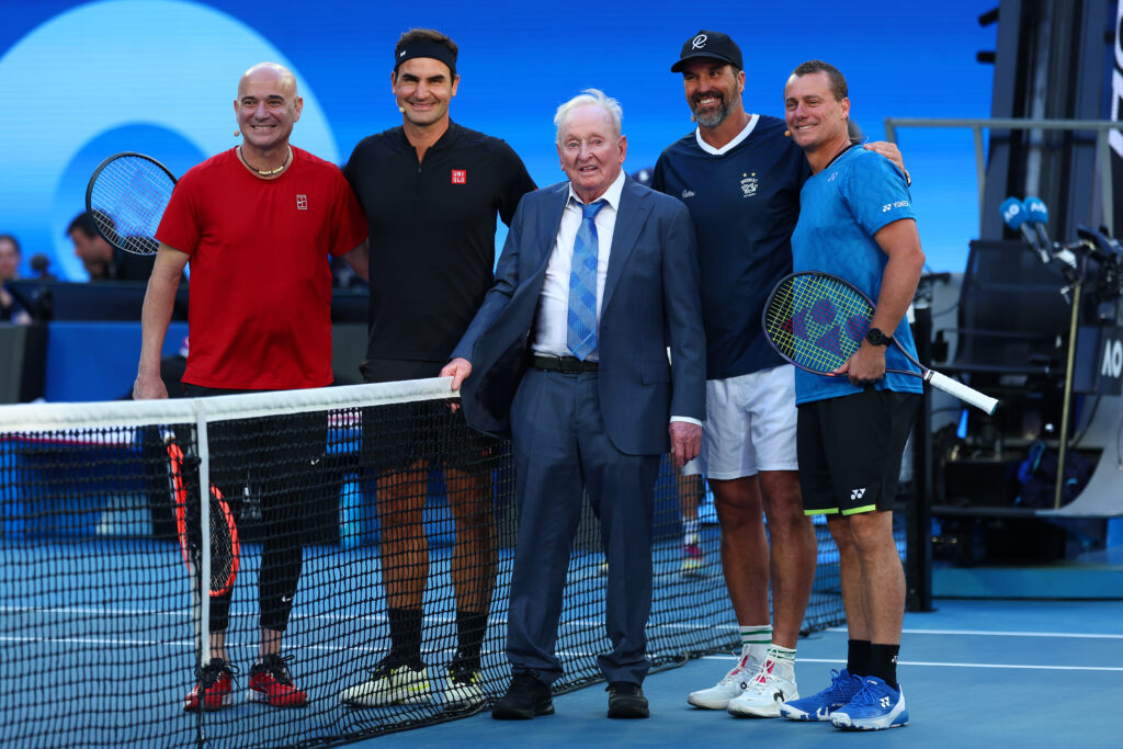Andre Agassi of the United States, Roger Federer of Switzerland, Rod Laver, Pat Rafter and Lleyton Hewitt of Australia pose for a photo during the Opening Ceremony ahead of the 2026 Australian Open at Melbourne Park on January 17, 2026 in Melbourne, Australia.